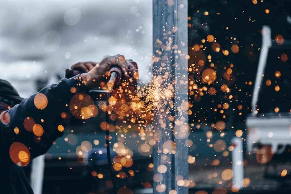 Metal fabrication work throwing sparks