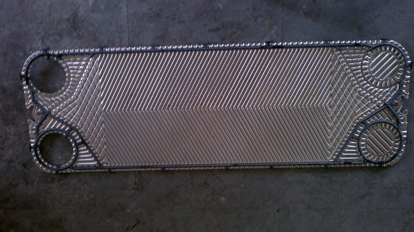 An end plate. For the Alfa Laval M15M, supplied by Synergizing Technologies.