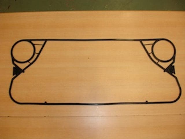 A moulded replacement gasket, arranged for parallel flow. For the Tranter GC26, supplied by Synergizing Technologies.